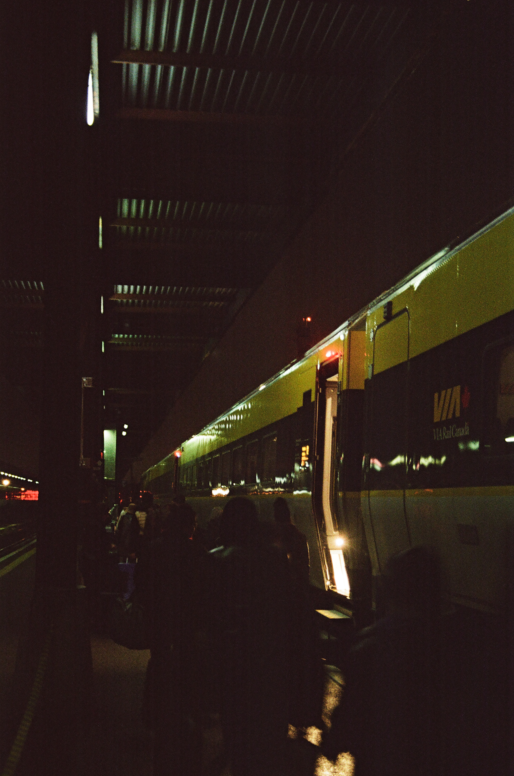 A VIA train at Ottawa's train station in the evening